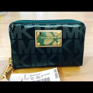 Micheal Kors cell phone wallet. NWT
