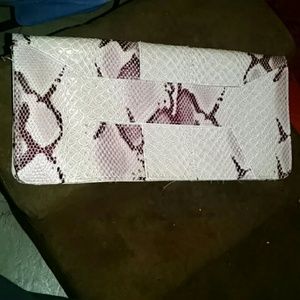 Faux Alligator skin clutch.