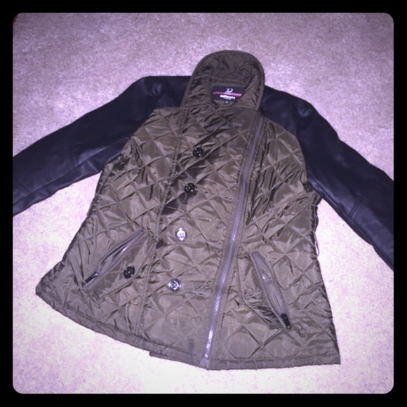 Green jacket with black leather sleeves