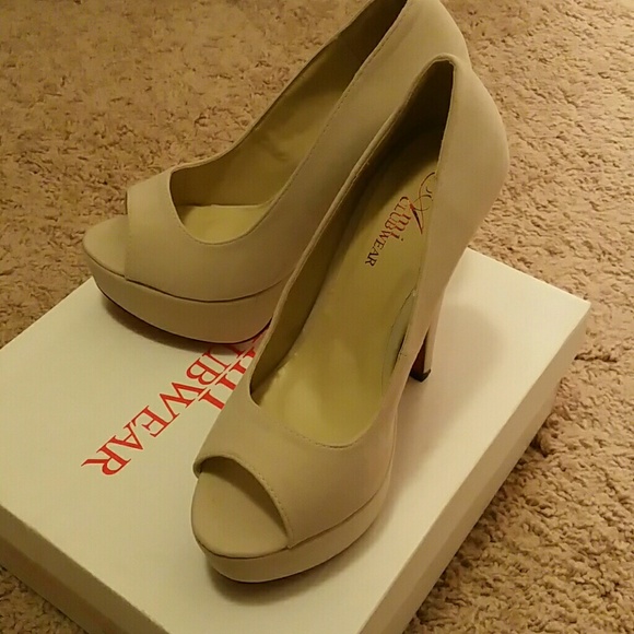 Nude suede pumps