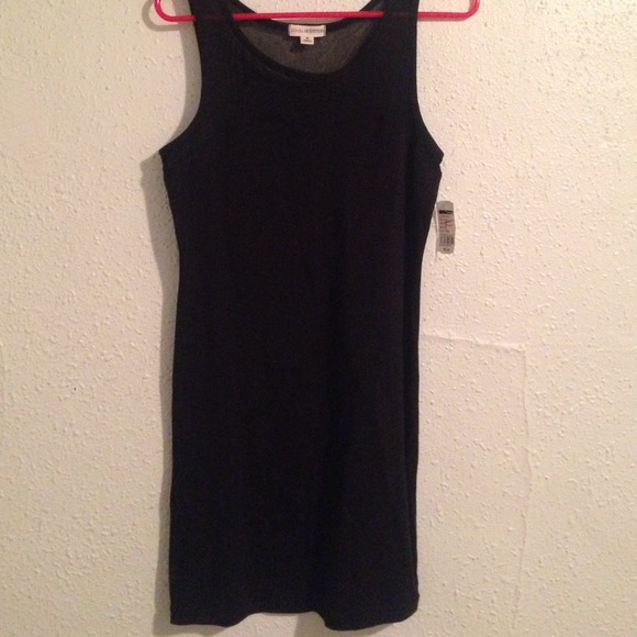 Little black dress with transparent neckline.