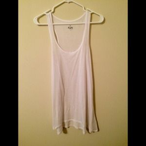 A white tank top/undershirt or layering piece.