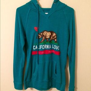 A long sleeve hooded shirt that's blue