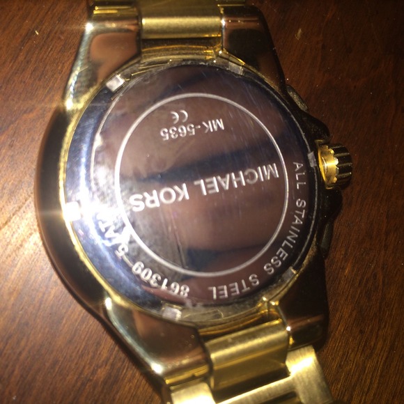 MK gold watch