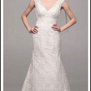 Brand New Wedding Dress still has tags.