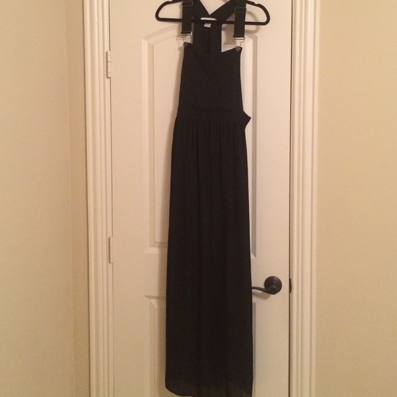 Overall dress with chiffon overlay.
