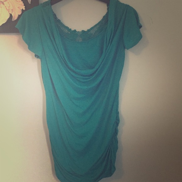 Teal/ green top.
