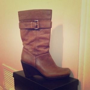 Slightly worn classic Stuart Weitzman boots.