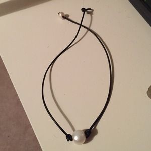 Pearl on a cord choker necklace