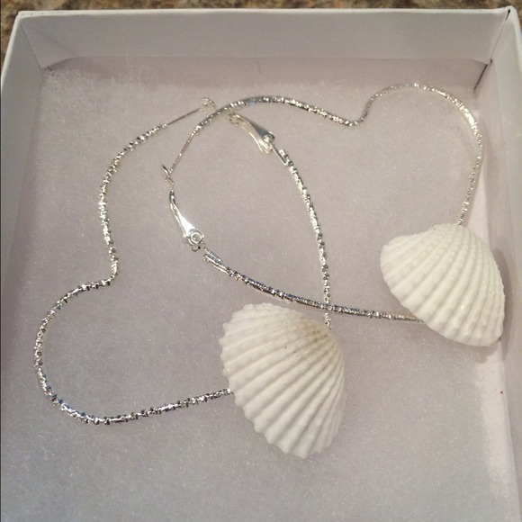 Beautiful heart seashell one of a kind earrings.
