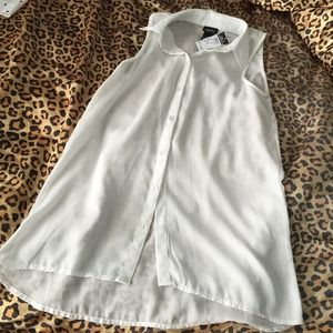 White sleeveless button down collard shirt