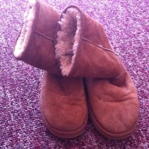Very worn Uggs. Size 9W