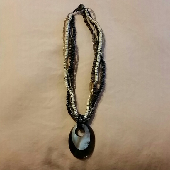 Brown wood plastic she'll necklace