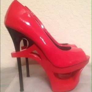 Wild Diva Lounge cut-out peep-toe platform heels.
