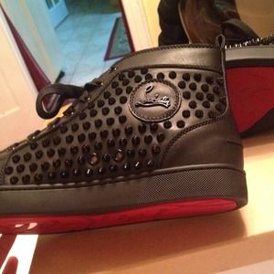 Authentic and new men's ChristianLouboutin sneaker