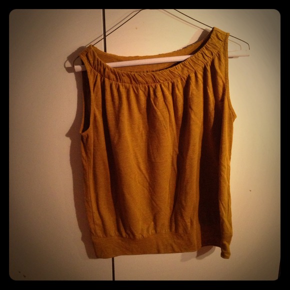 Beautiful sleeveless mustard color loose top