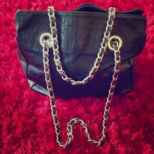 Black leather tote with gold chain handles