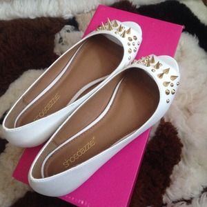 Open toe spiked flats