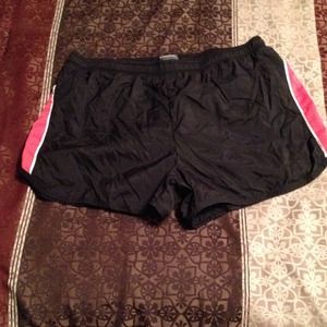 Pink and black running shorts