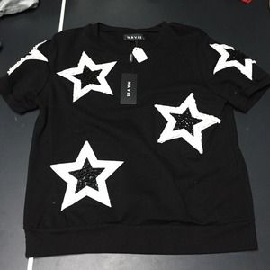 Black shirt with white sequined stars