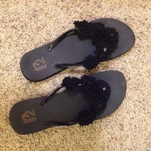 Black flip flops