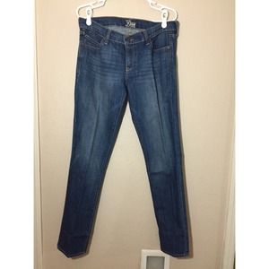 Washed dark blue skinny jeans