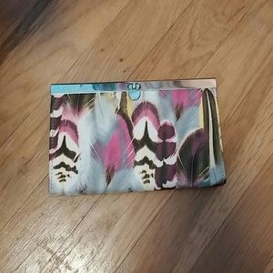 BRAND NEW feather design clutch