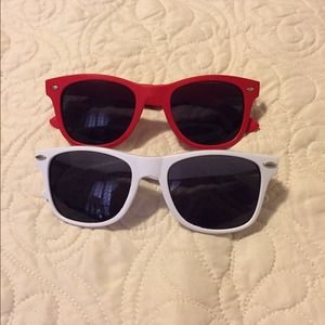 2 Pairs of Sunglasses. 2 Pairs of Sunglasses.