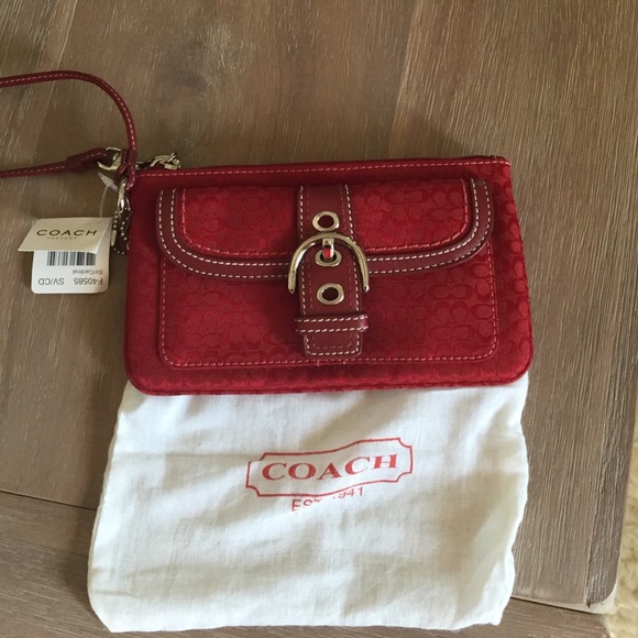 Red new with tags large wristlet in coach print
