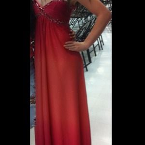 Pink and orange sparkle homecoming dress .