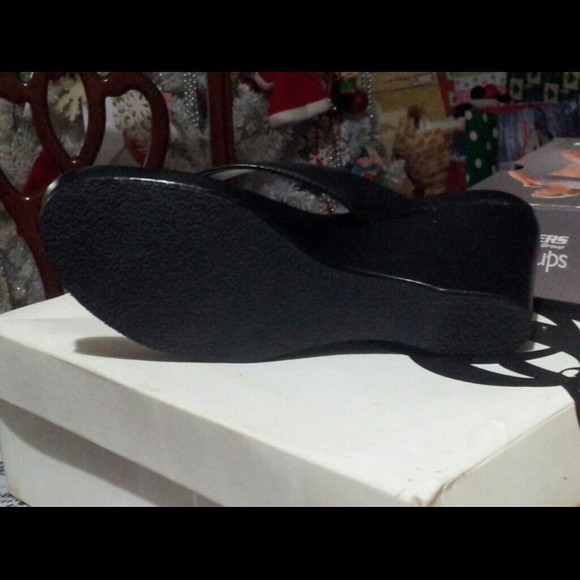 Black slip on dressing shoes.