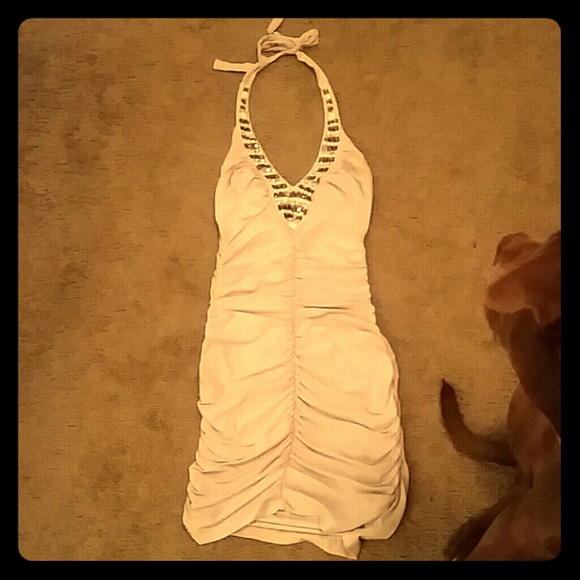 Beautiful creme colored dress embellished neckline