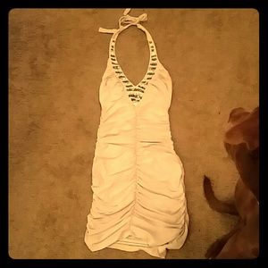 Beautiful creme colored dress embellished neckline