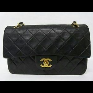 100% Authentic Chanel Black Lambskin Double Flaps
