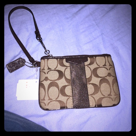 Brand new brown coach wristlet