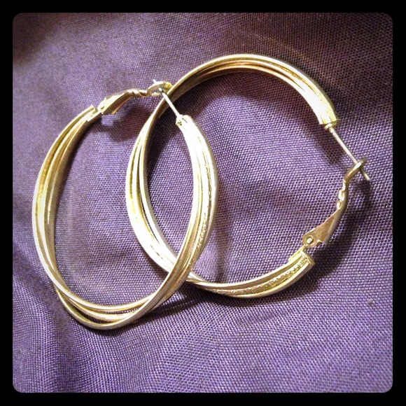Hoop earrings, silver in color