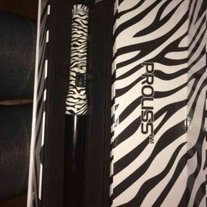 Curling wand 32"32" new never used