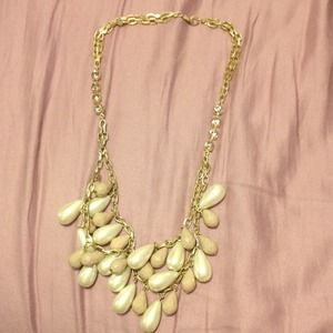 Gold pink and pearl colored decorative necklace