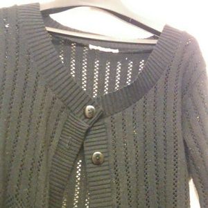 Black crochet cover.