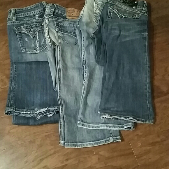 Bundled four pair jeans