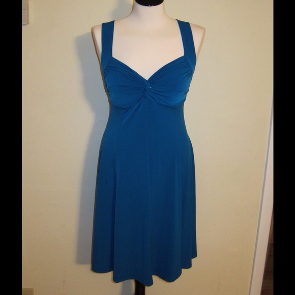 Moda International Dresses & Skirts - Beautiful and sexy teal/ blue twist tie dress