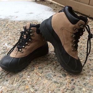 Tan and black duck boots