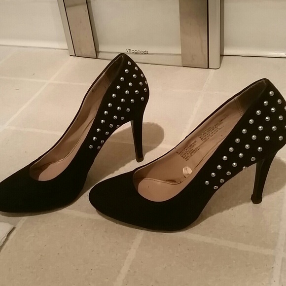 Black and gold studded high heels