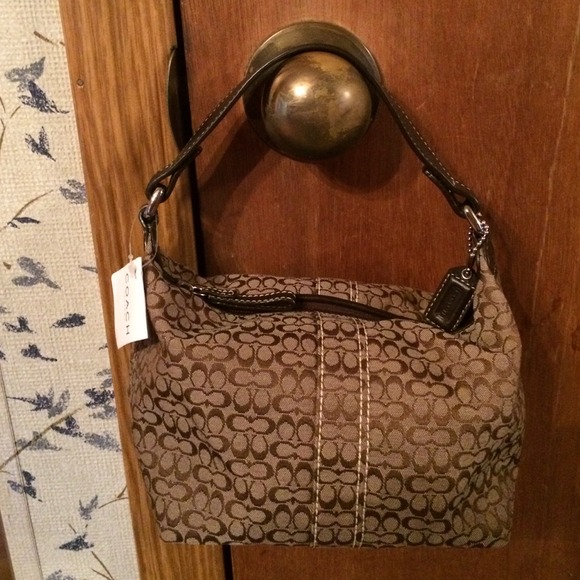 Small tan coach bag