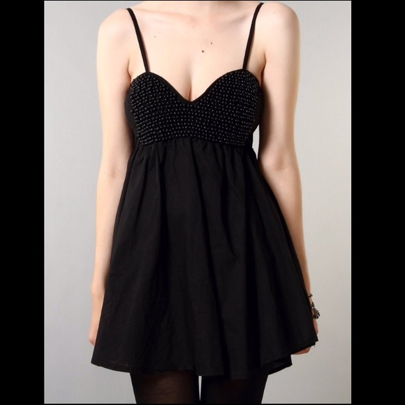 Reverse pearl bust black dress