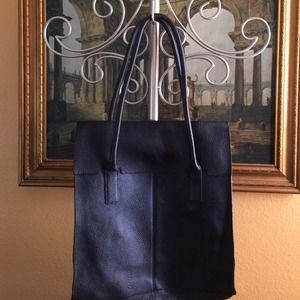Pebbled leather tote handbag.