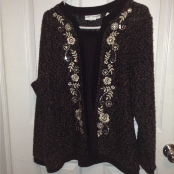 A polyester/acrylic Sweater shirt, and pants.