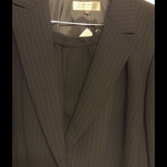 Black pin stripe pants suit.