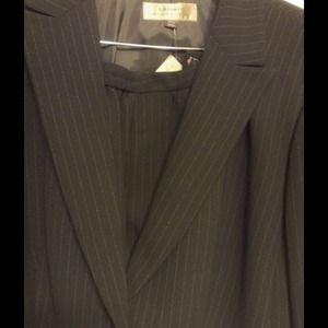 Black pin stripe pants suit.