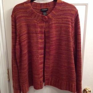 Coral colored sweater with single large button